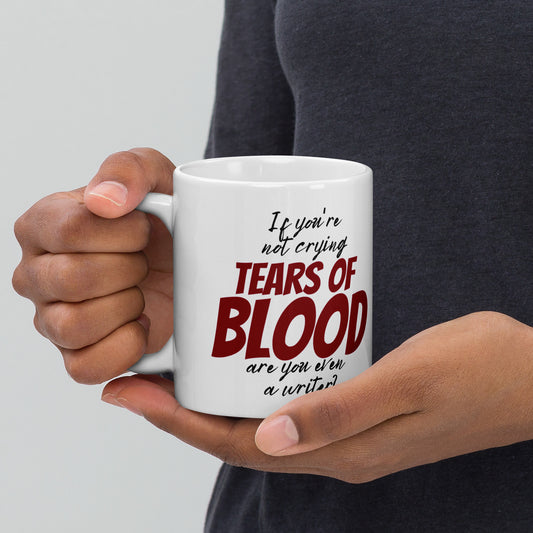 If you're not crying tears of blood are you even a writer? This white ceramic mug is the perfect gift for anyone suffering from poor reviews, writer's block or an overly sarcastic editor.