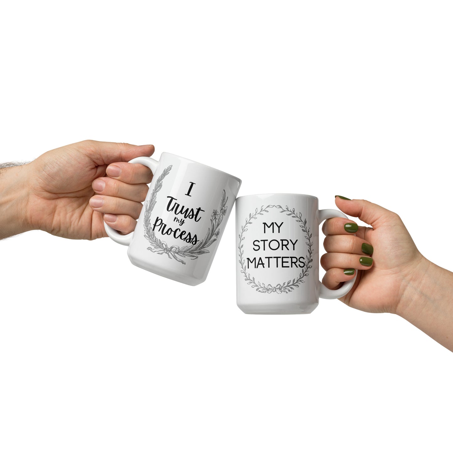 A white ceramic mug featuring two empowering affirmations for writers: I trust my process and My Story Matters. Stay focused and getting words on paper with this mug reminding you why you write.